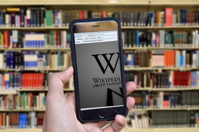 Wikipedia Bücher Enzyklopädie Themen Hand Iphone