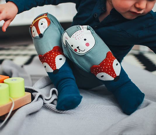 Kindererziehung: Tipps für das erste Jahr mit deinem Kind Photo Baby playing