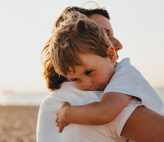 Photo Family enjoying beach