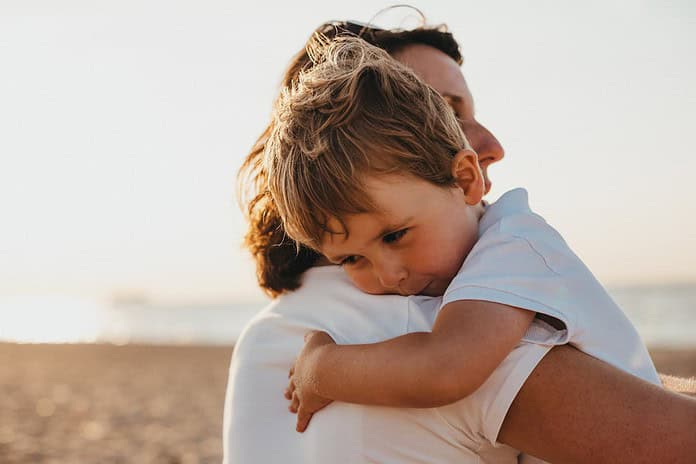 Photo Family enjoying beach