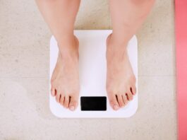 Kannst du mit ADHS Übergewicht vermeiden? Photo Weight scale